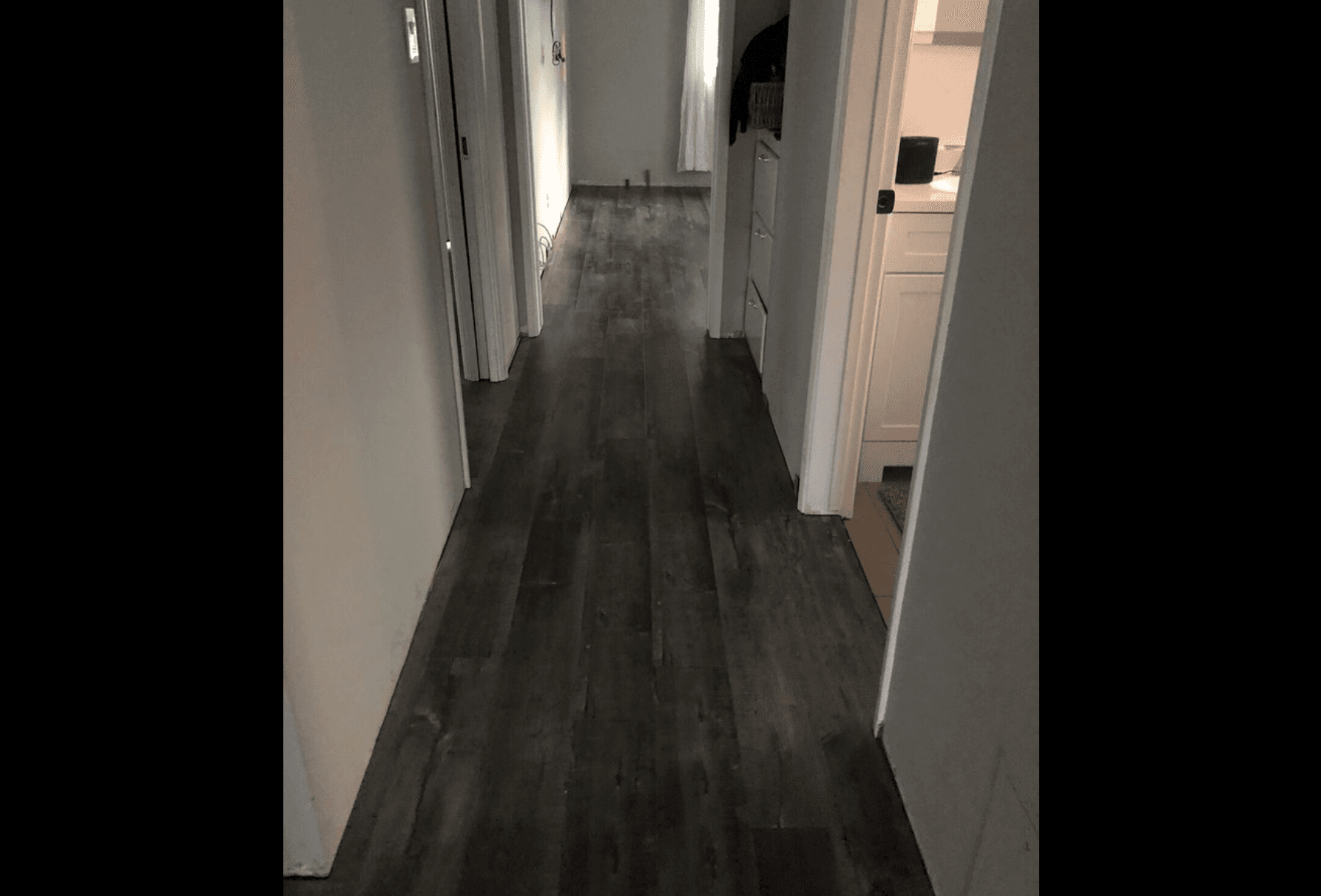 Hallway flooring installation by J & H Flooring