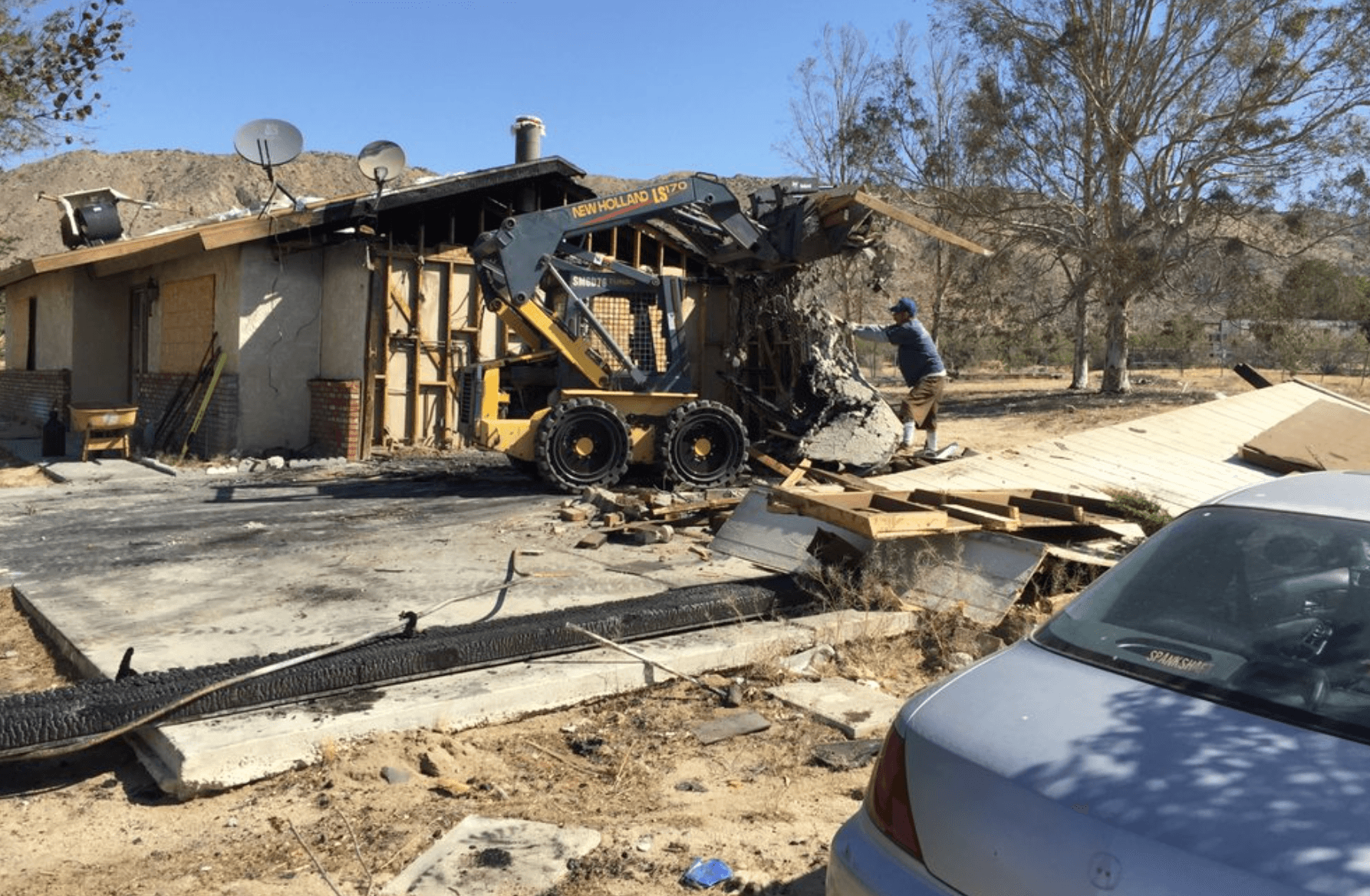 Damage restoration and debris removal project by Maximum Cleaning