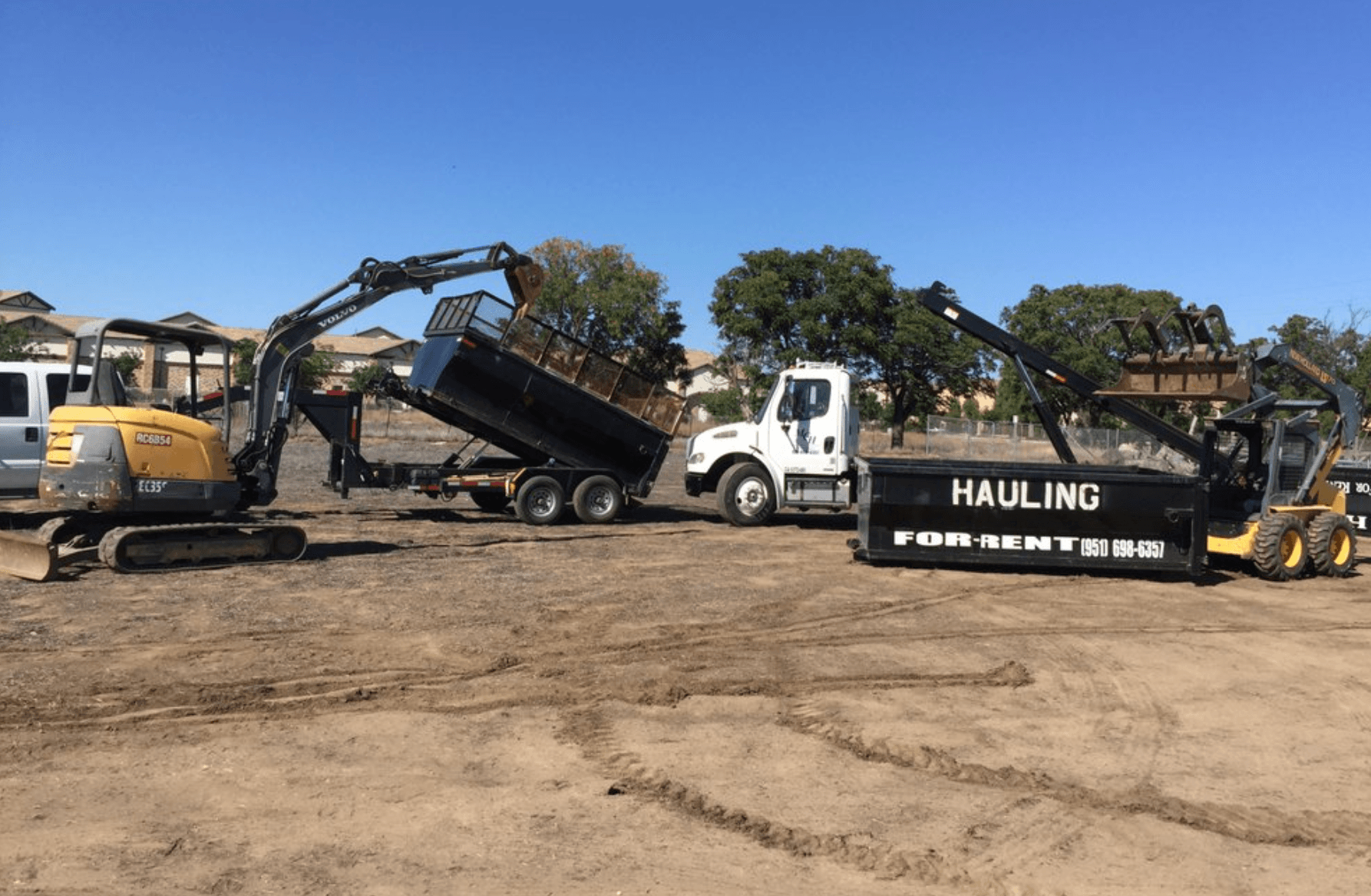 Heavy equipment and dumpster hauling by Maximum Cleaning